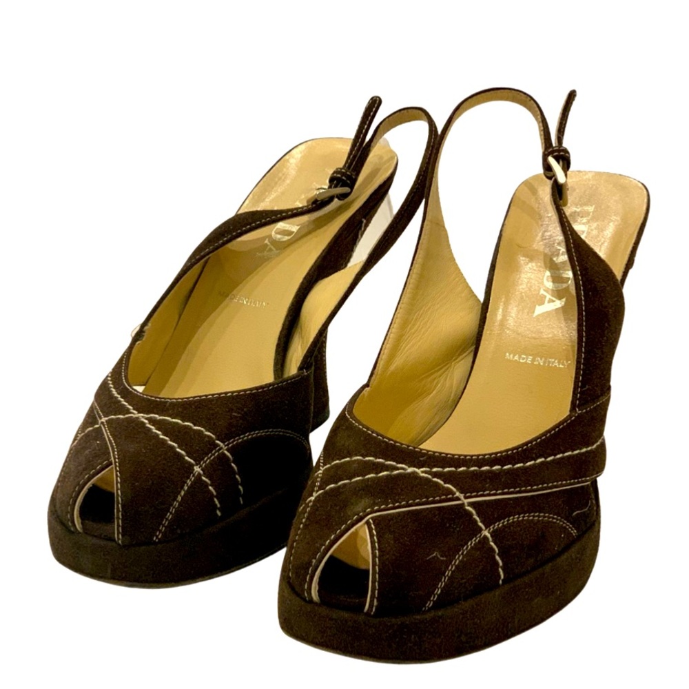 Prada brown suede peep toe platform sandal with Ivory stitching.